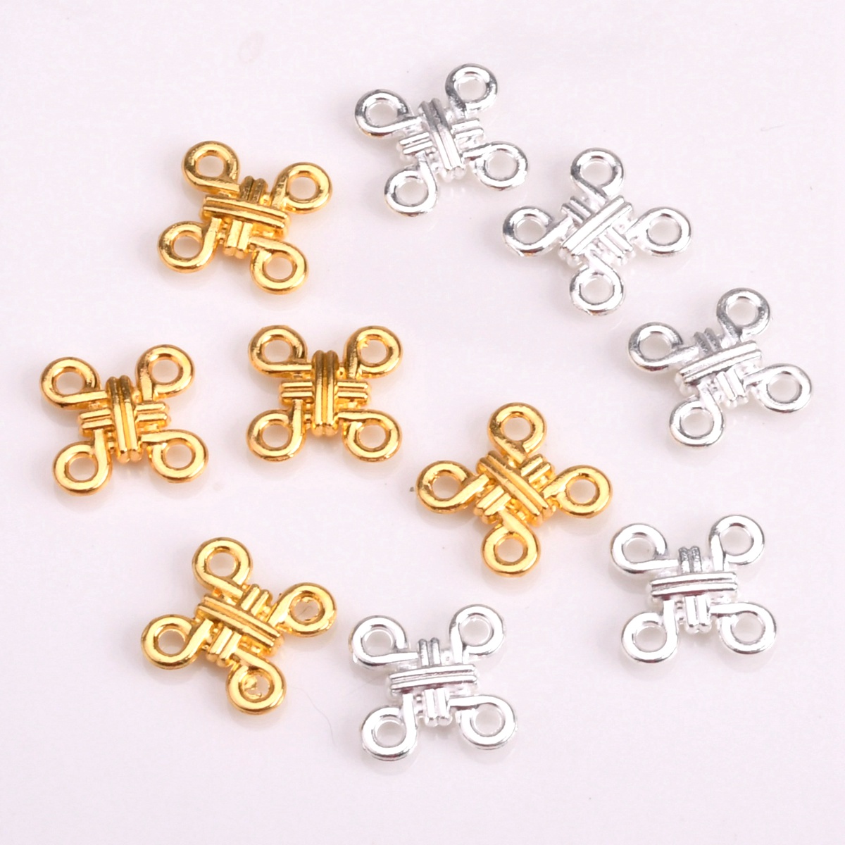 20 Stück Kreuzknoten-Form, 12  – Jewelry Making Knots Bewertung und Preis